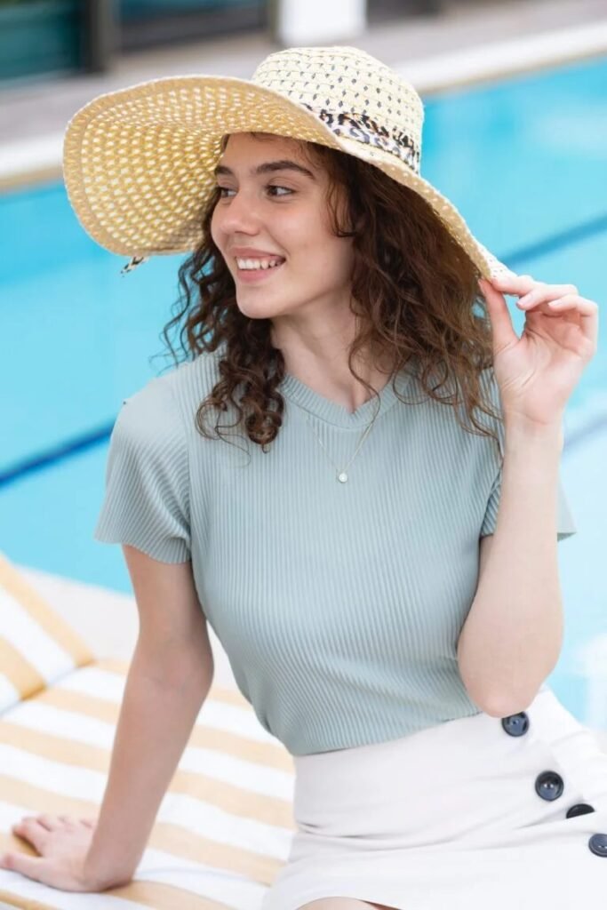 A Beautiful Girl Wearing A Hat